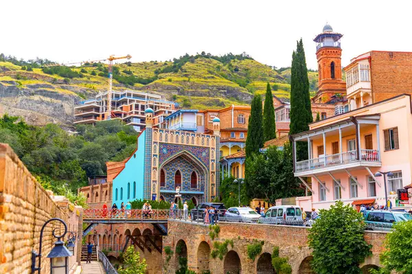 stock image Tbilisi, Georgia - 21 JUNE, 2024: Abanotubani meaning the bath district, is the ancient district of Tbilisi, Georgia, known for its sulphuric baths.