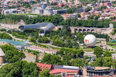 Tbilisi, Georgia - 22 JUNE, 2024: The Musical Theatre and the Exhibition Hall located inside the Rhike Park in Tbilisi, the capital of Georgia. clipart