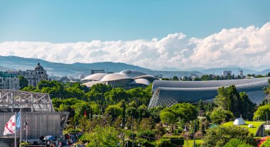 Tbilisi, Georgia - 22 JUNE, 2024: The Musical Theatre and the Exhibition Hall located inside the Rhike Park in Tbilisi, the capital of Georgia. clipart