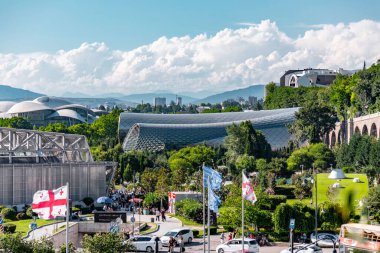 Tbilisi, Georgia - 22 JUNE, 2024: The Musical Theatre and the Exhibition Hall located inside the Rhike Park in Tbilisi, the capital of Georgia. clipart