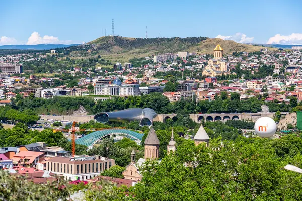 stock image Tbilisi, Georgia - 22 JUNE, 2024: Panoramic aerial view of the city of Tbilisi, the capital of Georgia.