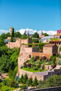 Tbilisi, Georgia - 22 JUNE, 2024: The remains of the old Isani fortress bastions and walls in Metekhi historic neighborhood in Tbilisi, Georgia clipart