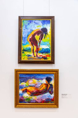 Tbilisi, Georgia - 14 AUG, 2024: Artworks by Georgian artists displayed at the Fine Arts Gallery of Georgia in Tbilisi. Artwork by Edmond Gabriel Kalandadze. clipart