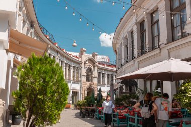 Tbilisi, Georgia - 12 AUG, 2024: Shardeni Street is a small walking street in the Upper Kala district of Tbilisi, Georgia. clipart