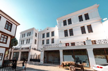 Tirilye, Turkiye - SEPT 29, 2024: The Stone School , Tas Mektep building, built between 1904 and 1909 in Neo-classical style. clipart