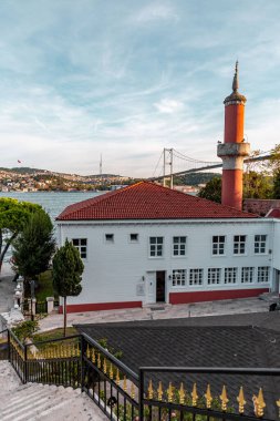 Istanbul, Turkiye - OCT 14, 2024: Defterdar Ibrahim pasha Mosque along the Bosphorus coastline in Kurucesme district of Istanbul, Turkiye. clipart