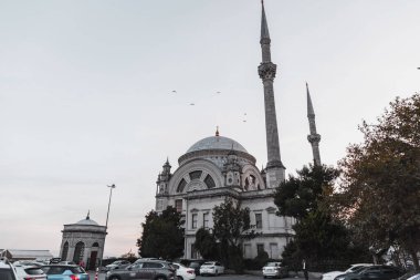 Istanbul, Turkiye - 14 OCT 2024: The Dolmabahce Mosque is a baroque mosque in Kabatas, Beyoglu. Commissioned by Bezmialem Valide Sultan and designed by the Turkish Armenian architect, Garabet Balyan in 1855. clipart