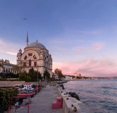 Istanbul, Turkiye - 14 OCT 2024: The Dolmabahce Mosque is a baroque mosque in Kabatas, Beyoglu. Commissioned by Bezmialem Valide Sultan and designed by the Turkish Armenian architect, Garabet Balyan in 1855. clipart