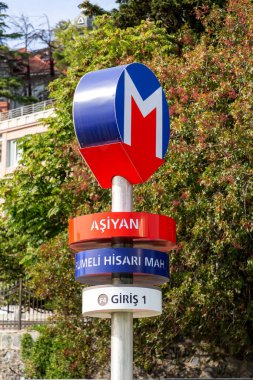 Istanbul, Turkiye - OCT 14, 2024: Istanbul Metro signboard at the Asiyan Rumelihisari Station on the European side of the Bosphorus. clipart