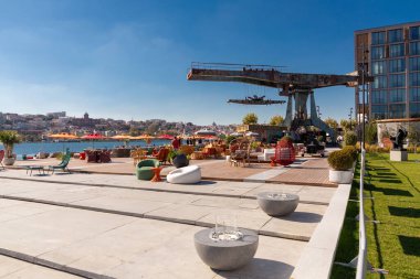 Istanbul, Turkiye - OCT 26, 2024: Rixos Tersane Istanbul hotel located on the coast of the Golden Horn combining modern luxury with a 600 year old dockyard's rich heritage. clipart