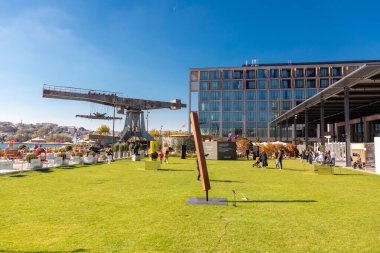 Istanbul, Turkiye - OCT 26, 2024: Rixos Tersane Istanbul hotel located on the coast of the Golden Horn combining modern luxury with a 600 year old dockyard's rich heritage. clipart