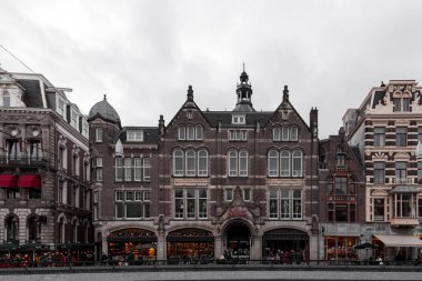 Amsterdam, NL, 10 OCT 2021: The Amsterdam Dungeon located at  the Damrak avenue at the centre of Amsterdam, Netherlands. clipart