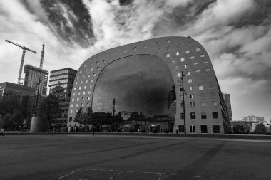 Rotterdam, Netherlands - OCT10, 2021: The Markthal is a residential and office building with a market hall underneath. Opened on October 1, 2014, by Queen Maxima of the Netherlands. clipart