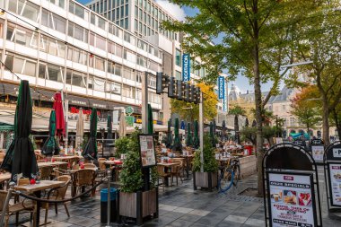 Rotterdam, Netherlands - October 10, 2021: The Lijnbaan is the main shopping street of Rotterdam. It was opened in 1953. clipart