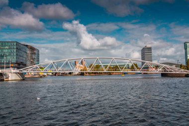 Amsterdam, NL - OCT 11, 2021: NEMO Science Museum is a science centre in Amsterdam, NL. It contains five floors of hands-on science exhibitions and is the largest science center in the country. clipart