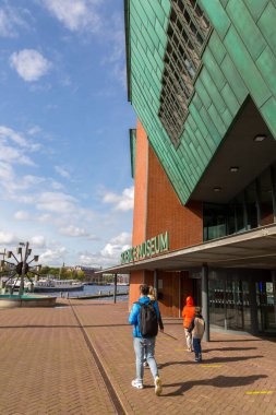 Amsterdam, NL - OCT 11, 2021: NEMO Science Museum is a science centre in Amsterdam, NL. It contains five floors of hands-on science exhibitions and is the largest science center in the country. clipart