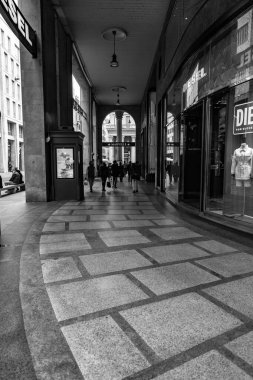 Milan, Italy - 30 March 2022: Corso Vittorio Emanuele II , formerly the Servi lane, is one of the most important streets in the center of Milan. It connects Piazza del Duomo to piazza San Babila. clipart