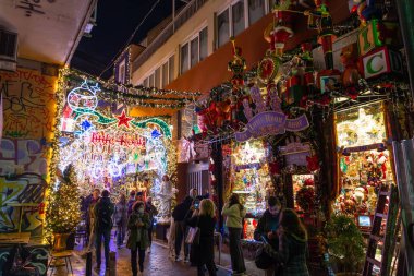 Athens, Greece - 26 Nov 2021: Psyri is a gentrified neighbourhood in Athens, today known for its restaurants, bars, live music tavernas etc. clipart