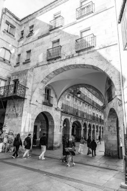 Salamanca, Spain-FEB 20, 2022: The Plaza Mayor of Salamanca is an urban space built as a main square that over time has become the center of social life in Salamanca, Spain. clipart