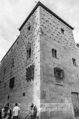 Salamanca, Spain - 20 FEB 2022: The Casa de las Conchas is a historical building in Salamanca, central Spain. It currently houses a public library. clipart