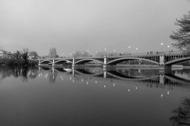 Salamanca, Spain - February 20, 2022: Enrique Estevan Bridge over the Tormes River in Salamanca, Castile and Leon, Spain. clipart