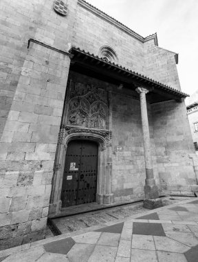 Salamanca, Spain-FEB 20, 2022: Exterior of San Benito Parish Church in the old town of Salamanca, Spain. clipart