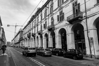 Turin, Italy - March 27, 2022: Street view and architecture on Via Po, a central street in Turin, the capital of Piedmont, Italy. clipart