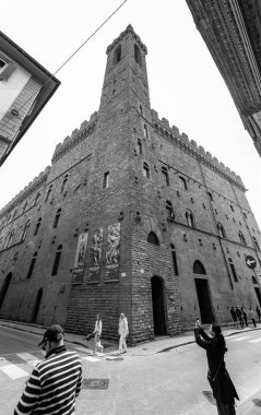 Florence, Italy - April 5, 2022: Facade of the Palazzo Strozzi, a significant historical edifice in Florence, Tuscany, Italy. clipart