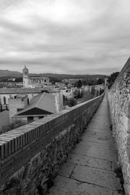 Ancient city walls of Girona, one of the most complete city walls in Europe. clipart