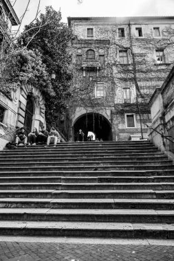 Rome, Italy - April 7, 2019: Borgia Steps which connects Via Cavour with Piazza San Pietro in Vincoli in Monti district of Rome, Italy. clipart