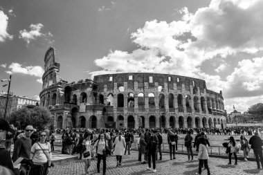 Rome, Italy - April 5, 2019: Exterior view of the ancient Roman Colloseum or Flavian Amphitheather in Rome, Italy. clipart