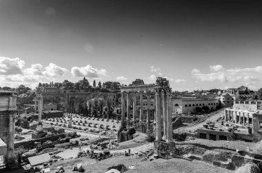 Rome, Italy - April 5, 2019: Forum Romanum is a rectangular forum surrounded by the ruins of several important ancient government buildings at the centre of Rome. clipart