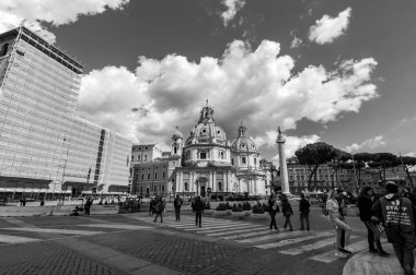 Rome, Italy - April 5, 2019: View of Santa Maria di Loreto and Chiesa del Santissimo Nome di Maria al Foro Traiano Churches in Piazza Venezia. clipart