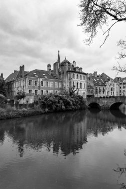 Metz, France - January 23, 2022: Cityscape view from the beautiful city of Metz in France. Bridges, houses and churches on the bank of the Moselle River. clipart