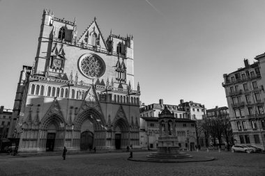 Lyon, France - January 25, 2022: Exterior view of the St. John the Baptist Cathedral at the St. John Square or Place St. Jean in Lyon, France. clipart