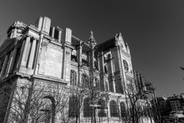 Paris, France - JAN 24, 2022: Exterior view of the Church of St. Eustache, Paris (French: Leglise Saint Eustache) in the 1st arrondissement of Paris. Built between 1532 and 1632.  clipart