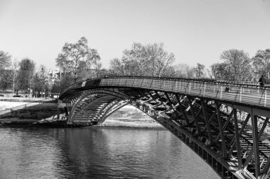 Paris, France - JAN 24, 2022: The passerelle Leopold-Sedar-Senghor, formerly known as passerelle Solferino, is a footbridge over the River Seine in the 7th arrondissement of Paris. clipart