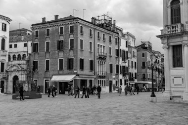 Venice, Italy - April 2, 2022: Campo Santo Stefano is a city square near the Ponte dell'Accademia, in the sestiere of San Marco, Venice, Italy. clipart