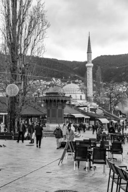 Sarajevo - BiH - 10 FEB 2024: Bascarsija is Sarajevo's old bazaar and the historical center of the city, built in the 15th century when Isa Beg Ishakovic founded the city. clipart