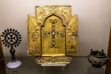 Etchmiadzin, Armenia - June 23, 2024: Khotekerats Sourp Nishan reliquary with relic of Jesus Christ's wooden cross in Treasury Museum of Mother See of Holy Etchmiadzin clipart