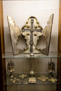 Etchmiadzin, Armenia - June 23, 2024: cross of King Ashot Yerkat with relic of Jesus Christ's wooden cross in Treasury Museum of Mother See of Holy Etchmiadzin clipart