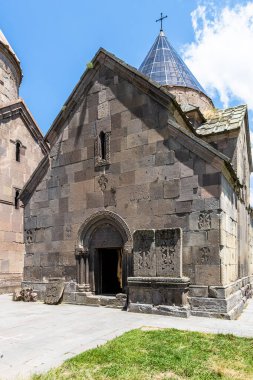 Goshavank, Armenia - July 6, 2024: Grigor Lusavorich Church in Goshavank monastery, Armenia on sunny summer day clipart