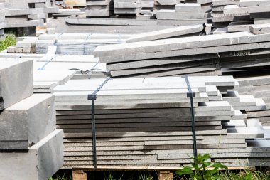 concrete slabs and curbs for repair of urban square in Gyumri city, Armenia on summer day clipart