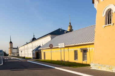 walls of Holy Trinity Novo-Golutvin Monastery in Old Kolomna city on sunny summer evening clipart