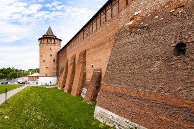 Kolomna Kremlin outside walls and Marinkina Tower in Old Kolomna city on summer day clipart