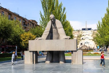 Yerevan, Armenia - October 1, 2023: Monument to Alexander Tamanyan on boulevard in Yerevan city on sunny day. It was erected in 1974 by sculptor Hovsepyan and architect Seda Petrosyan clipart