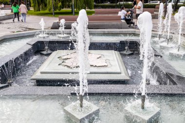 Yerevan, Armenia - October 1, 2023: Map of city of Yerevan made of quartzite in water fountain in Park of 2800th anniversary of founding of city of Yerevan on Italy street in Yerevan on autumn day clipart