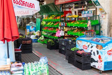 Batumi, Georgia - September 19, 2023: outdoor vegetable shop and small grocery store on street of Batumi city on autumn day clipart