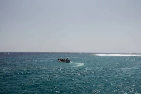 inflatable boat with lot of snorkeler at the red sea on vacation in egypt