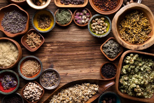 Natural Medicine Background Assorted Dry Herbs Bowls Mortar Plants Rustic — Stock Fotó